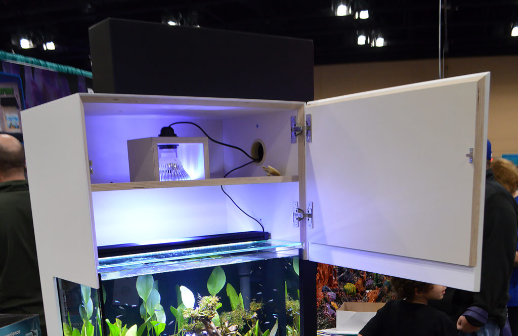 A look above the aquarium reveals ample space for LED lights and storage. Note the standpipe and return tubes in the aquarium as well, which allow for water to move between the aquarium and the sump below.