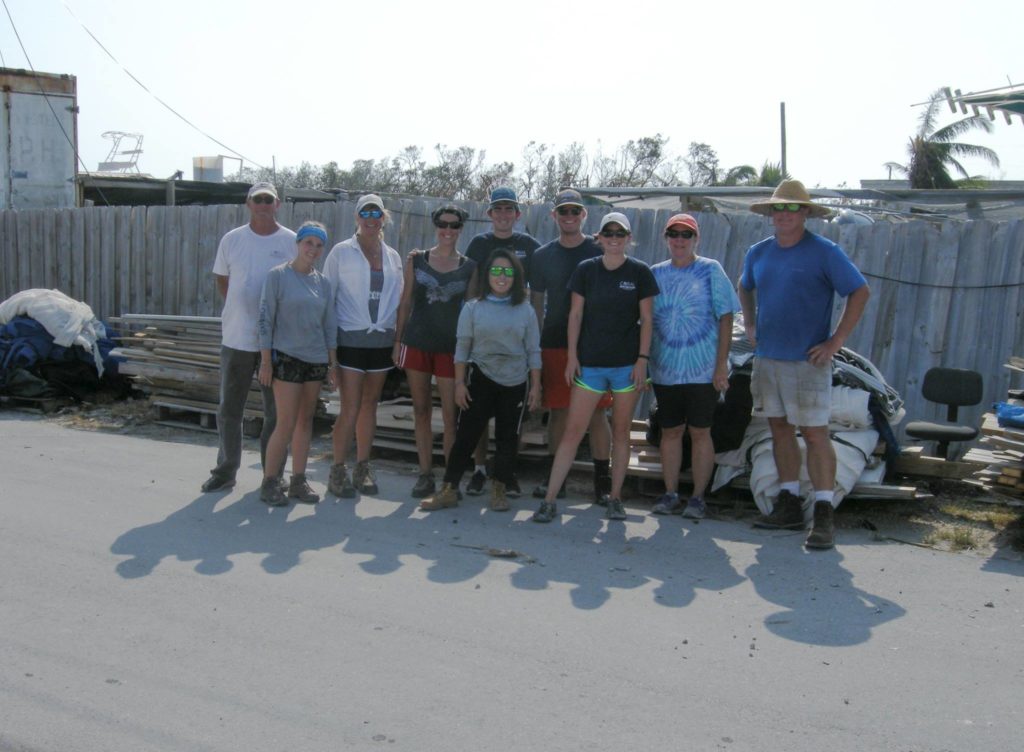 Bill Backus (at far right) and his daughter Mari (2nd in from left) who managed the Marathon coral farm, are joined by staff and volunteers from the Coral Restoration Foundation in the clean-up effort.