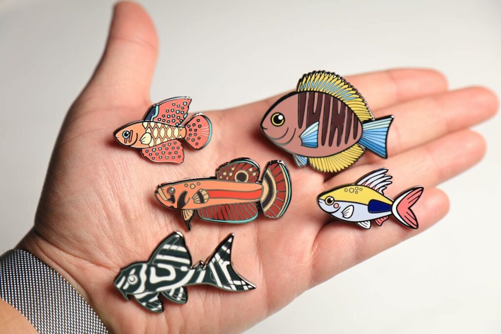 Sumer Tiwari has released 5 new hard-enamel fish pins at the end of 2022 in support of the work of Dr. Leandro Sousa!